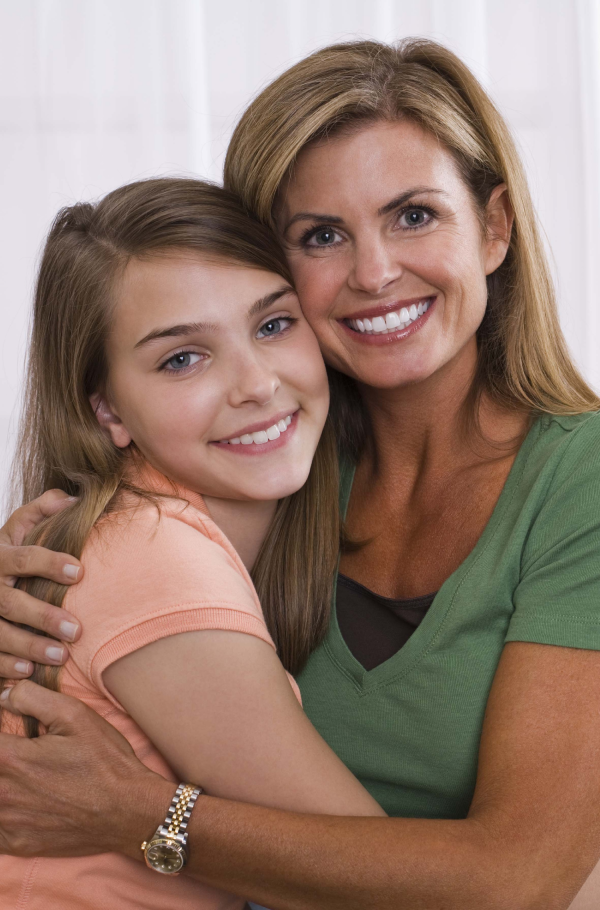 Mother and daughter are smiling
